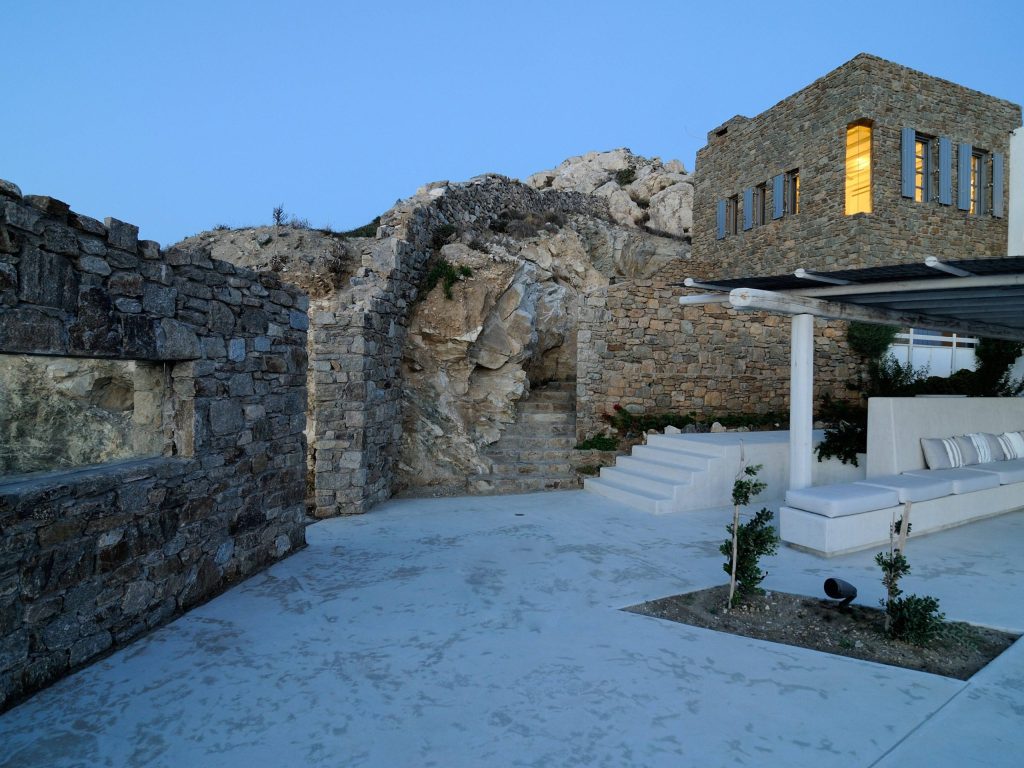 luxury villas - outside view of villa with stony landscape