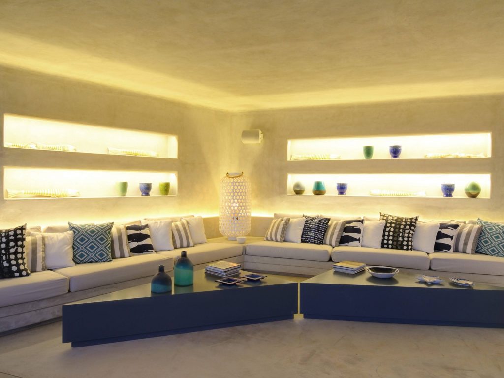 luxury villas - outside relaxing area with pillows in different colors and cosy light