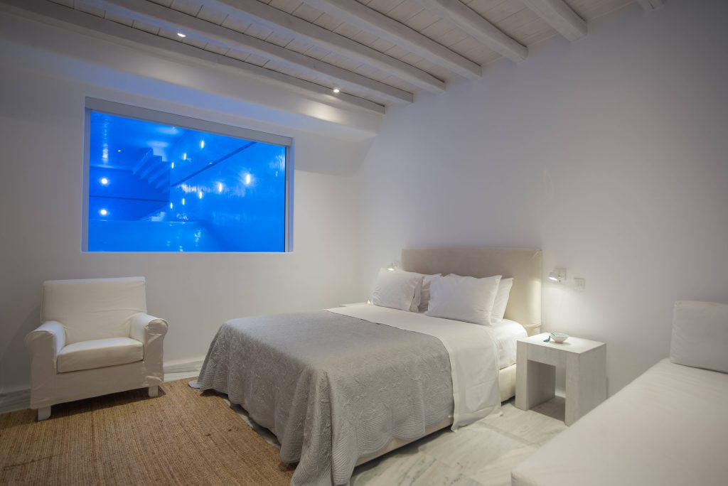 bedroom with pool view